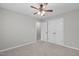 Clean bedroom with neutral carpet and paint and a double door closet at 297 Curragh Cv, Fuquay Varina, NC 27526