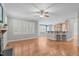 Open-concept living room flows into a kitchen area with a breakfast bar, showcasing an ideal layout at 297 Curragh Cv, Fuquay Varina, NC 27526