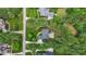 Aerial view of a property with mature trees and landscaping at 3004 Krogen Ct, Creedmoor, NC 27522