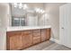 Bathroom featuring double sinks, cabinetry, and granite countertops at 3004 Krogen Ct, Creedmoor, NC 27522