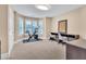 Versatile bedroom featuring a desk area, exercise bike, and natural light at 3004 Krogen Ct, Creedmoor, NC 27522