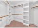 Spacious walk-in closet with built-in shelving and rods for ample storage at 3004 Krogen Ct, Creedmoor, NC 27522