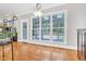 The dining area has large windows that offer views of the outdoors at 3004 Krogen Ct, Creedmoor, NC 27522