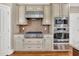 Beautiful kitchen featuring stainless steel appliances, granite countertops, and custom cabinetry at 3004 Krogen Ct, Creedmoor, NC 27522