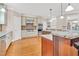 Spacious kitchen featuring stainless appliances, granite countertops, and custom cabinetry at 3004 Krogen Ct, Creedmoor, NC 27522