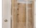 This bathroom features a tiled shower with glass doors and built-in shelving at 3004 Krogen Ct, Creedmoor, NC 27522