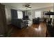 Cozy living room with hardwood floors, grey walls, and natural lighting at 306 W Canary St, Dunn, NC 28334