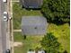 Aerial view of the roof and surrounding yard and neighborhood at 312 W Front St, Oxford, NC 27565