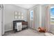 Cozy Bedroom features a crib, window with bright light, and playful decor at 321 Calvander Ln, Apex, NC 27539