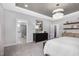 Spacious main bedroom with decoratively trayed ceiling, ensuite bathroom and luxury finishings at 321 Calvander Ln, Apex, NC 27539