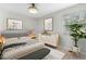 Stylishly decorated bedroom with a neutral color palette, window, and modern decor at 4021 Chaucer Dr, Durham, NC 27705