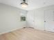 Empty bedroom with light hardwood floors and a large window at 4021 Chaucer Dr, Durham, NC 27705
