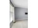 A wall mounted TV mount and bright natural light in this open bedroom at 4021 Chaucer Dr, Durham, NC 27705