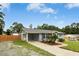 View of a cozy carport with attached garage providing ample parking space at 4021 Chaucer Dr, Durham, NC 27705