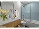 Stylish bathroom featuring a modern vanity, tiled shower, and sleek fixtures at 4259 Old Faison Rd, Knightdale, NC 27545