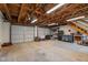 Spacious three car garage with ample storage, work bench and accessories at 4259 Old Faison Rd, Knightdale, NC 27545