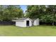 Two backyard sheds offer practical storage space and match the house's exterior, adding to the property's functionality at 4259 Old Faison Rd, Knightdale, NC 27545
