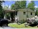 Exterior view of a house with a covered front porch and a trailer at 4601 Orange Grove Rd, Hillsborough, NC 27278