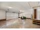 Spacious garage featuring an automatic door, brick trim, and access to the home at 4964 Stafford Mill Rd, Liberty, NC 27298
