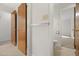 Hallway with carpet, with a toilet and a view of a bedroom at 4964 Stafford Mill Rd, Liberty, NC 27298