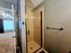 Modern bathroom with glass-enclosed shower at 5301 Peacenest Dr, Raleigh, NC 27610