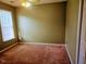 Bedroom with window and neutral paint at 5301 Peacenest Dr, Raleigh, NC 27610