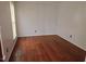 This bedroom features hardwood floors, and neutral colored walls at 5301 Peacenest Dr, Raleigh, NC 27610