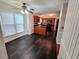 Eat in kitchen area with black tile floors and view into kitchen at 5301 Peacenest Dr, Raleigh, NC 27610