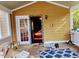 A covered patio with a table, chairs, and a view of the backyard at 5301 Peacenest Dr, Raleigh, NC 27610