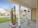 Inviting covered porch with ample space for seating and relaxation at 800 Tree Green Ln, Wake Forest, NC 27587