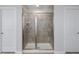 Bathroom with a shower that features tile and sliding glass doors at 800 Tree Green Ln, Wake Forest, NC 27587