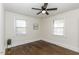 Charming bedroom features hardwood floors, ceiling fan, and plenty of natural light at 931 Eastern Ave, Nashville, NC 27856
