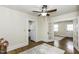 Living room featuring access to kitchen, french doors, and wood flooring at 931 Eastern Ave, Nashville, NC 27856