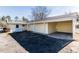 Backyard view, showing the home and covered parking area at 9439 Clayton Blvd, Clayton, NC 27520