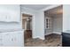 Eat-in kitchen area with white cabinetry and stainless steel appliances at 9439 Clayton Blvd, Clayton, NC 27520