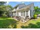 Backyard patio with outdoor seating and grill, perfect for entertaining at 1 Lake Hill Dr, Durham, NC 27713