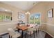 Cozy dining room featuring a wooden table and natural lighting at 1 Lake Hill Dr, Durham, NC 27713