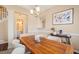 Elegant dining area adjacent to a bathroom and staircase at 1 Lake Hill Dr, Durham, NC 27713