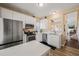 Bright kitchen with white cabinets, stainless steel appliances, and modern countertops at 1 Lake Hill Dr, Durham, NC 27713