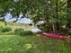 Enjoy direct lake access for kayaking with grassy area, perfect for outdoor water activities and relaxation at 1 Lake Hill Dr, Durham, NC 27713