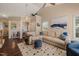 Open living room with a comfortable sectional sofa and stylish decor at 1 Lake Hill Dr, Durham, NC 27713