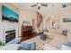 Spacious living room with vaulted ceilings, fireplace, and staircase at 1 Lake Hill Dr, Durham, NC 27713