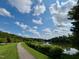 Take a leisurely stroll along the paved walking trail with serene lake views, ideal for outdoor enjoyment at 1 Lake Hill Dr, Durham, NC 27713