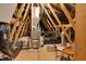 Attic with a modern furnace and complex ductwork at 1124 Cedar Farm Trl, Fuquay Varina, NC 27526