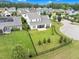 Landscaped backyard with a black fence surrounding the property at 1124 Cedar Farm Trl, Fuquay Varina, NC 27526