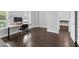 Home office with desk, chair, and plenty of natural light from a bright window at 1124 Cedar Farm Trl, Fuquay Varina, NC 27526
