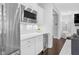 Elegant kitchen with stainless steel refrigerator, microwave and plenty of storage space at 1124 Cedar Farm Trl, Fuquay Varina, NC 27526