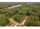Beautiful aerial view of wooded property with lake access at 114 Crow Dr, Louisburg, NC 27549