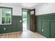 Welcoming entryway boasting detailed trim and paneling at 114 Crow Dr, Louisburg, NC 27549