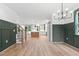 Open-concept living space with wood floors at 114 Crow Dr, Louisburg, NC 27549